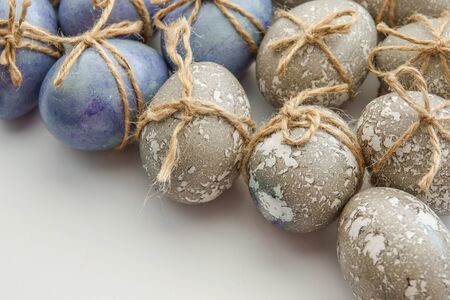 Colored grey and blue decorated Easter Eggsの写真素材