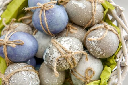 Colored grey and blue decorated Easter Eggsの写真素材