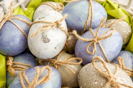 Colored grey and blue decorated Easter Eggsの写真素材