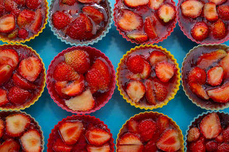 Strawberry jelly isolated on blue backgroundの写真素材