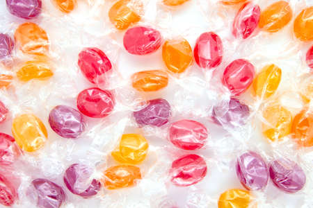 A close up of multicolored crystal rock candy.の写真素材