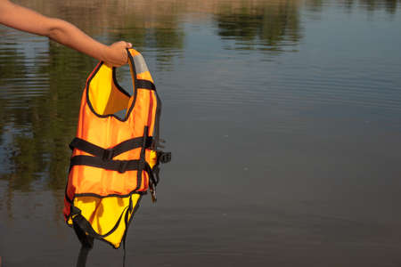 Red life-jacket. Necessary object for sailing.の写真素材