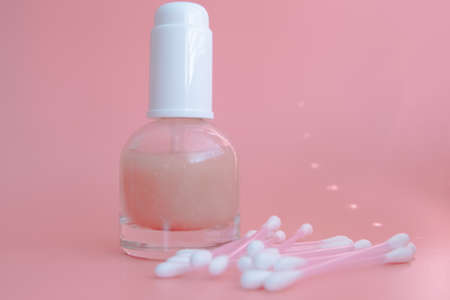 beautiful skin flat lay care pink serum liquid dropper minimal white backgroundの写真素材