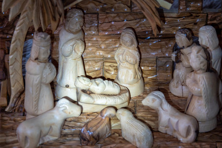 Christmas nativity scene with three Wise Men presenting gifts to baby Jesusの写真素材