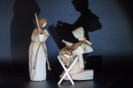 Christmas nativity scene with three Wise Men presenting gifts to baby Jesusの写真素材