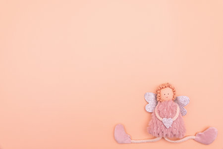 christmas or new year frame composition. christmas gold decorations on pink background with empty copy space for text. holiday and celebration concept for postcard or invitation. top view. flat layの写真素材