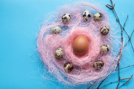 Easter card with eggs in nest over wood