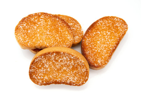 a piece of brown bread biscuit isolated on a white backgroundの写真素材