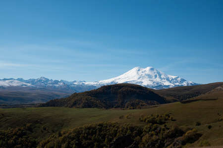 Elbrus And Green Hills At Sunny Summer Day. Elbrus Region, North Caucasusの写真素材