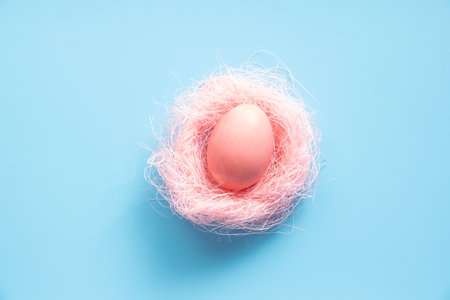 Easter eggs painted in pastel colors on blue. Easter conceptの写真素材