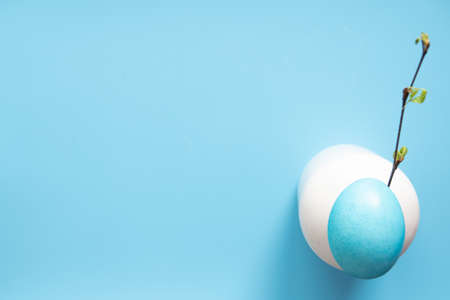 Easter eggs painted in pastel colors on blue. Easter conceptの写真素材