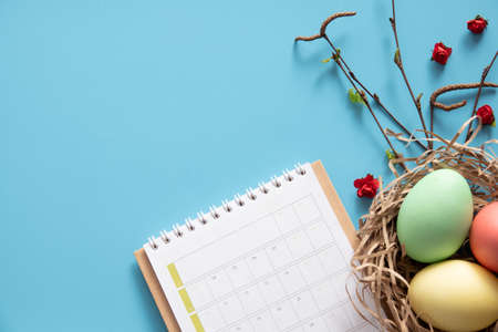 Easter eggs painted in pastel colors on blue. Easter conceptの写真素材