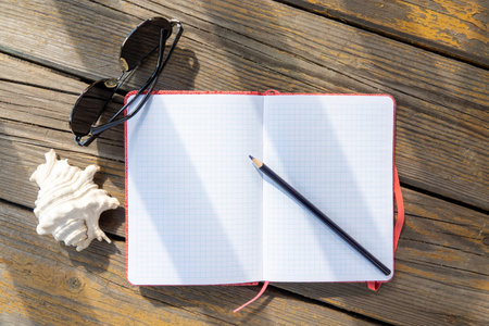 closeup of old wood planks texture and grass backgroundの写真素材