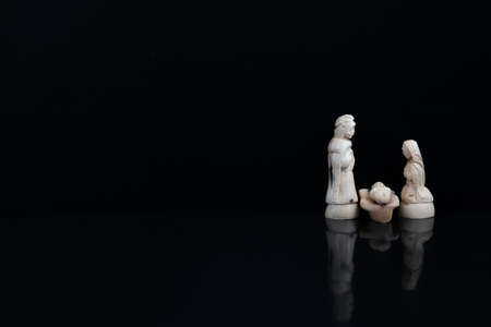 Christmas nativity scene with three Wise Men presenting gifts to baby Jesus, Mary Josephの写真素材