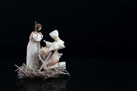 Christmas nativity scene with three Wise Men presenting gifts to baby Jesus, Mary Josephの写真素材