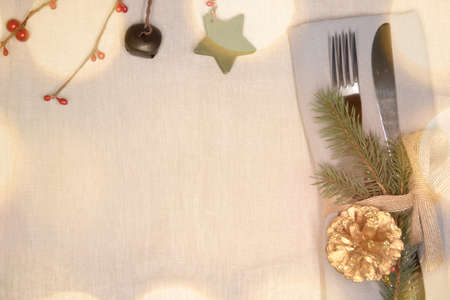 Christmas place setting with ribbon and christmas decorations