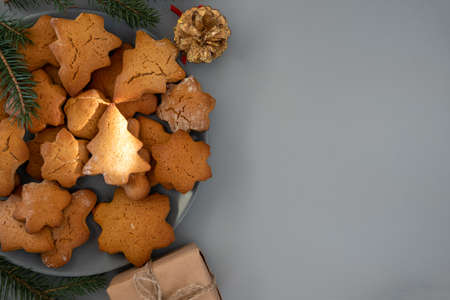 Happy New Year's set of gingerbread from ginger biscuits man glazed sugar icing decoration on black...