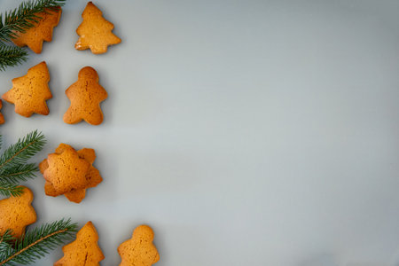 Happy New Year's set of gingerbread from ginger biscuits man glazed sugar icing decoration on black...