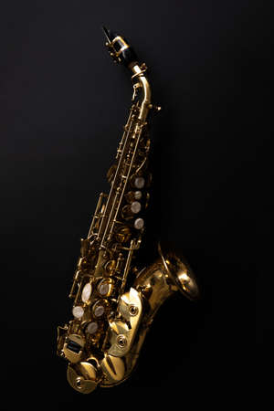 Saxophone jazz instruments. Soprano sax isolated. Saxophone music instrument closeup on blackの写真素材