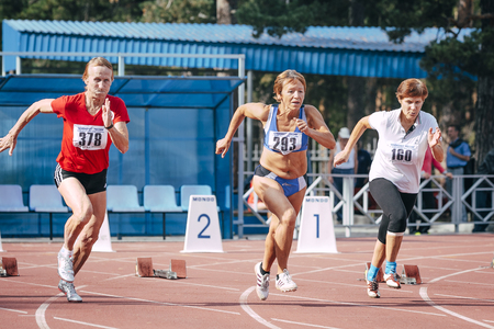 Chelyabinsk, Russia - August 28, 2015:  old women's start at 100 meters during championship of Russia on track and field athletics among the elderly, Chelyabinsk, Russia - August 28, 2015のeditorial素材