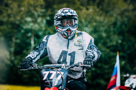 Kyshtym, Russia - July 26, 2015: racer motocross preparing to start during the race Urals Cup of Enduro "Forest watch", Kyshtym, Russia - July 26, 2015のeditorial素材