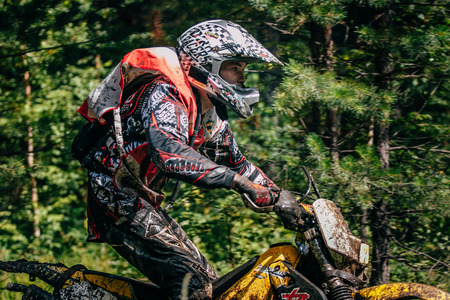 Kyshtym, Russia - July 26, 2015: motocross racer on the track during the race Urals Cup of Enduro "Forest watch", Kyshtym, Russia - July 26, 2015のeditorial素材