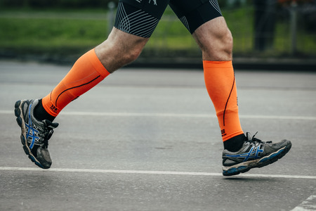 Omsk, Russia -  September 20, 2015: athlete running on the street during Siberian international marathonのeditorial素材