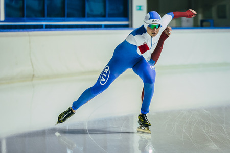 Chelyabinsk, Russia - October 15, 2015: starting acceleration athlete speed skaters during Cup of Russia on speed skatingのeditorial素材