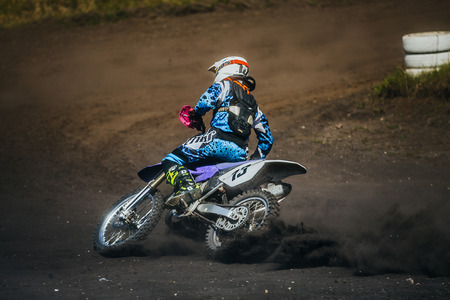 Miasskoe, Russia - May 02, 2016: racer on a motorcycle skid on race track during Cup of Urals motocrossのeditorial素材