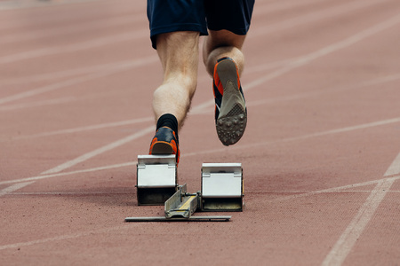 start of sprint athlete men. rear view only legsの写真素材