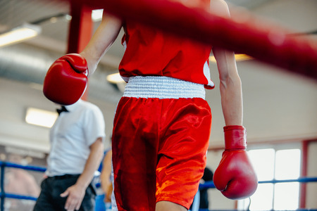 break between rounds male boxer goes corner ring