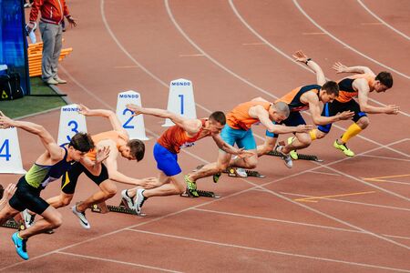 Chelyabinsk, Russia - June 4, 2017: sprinters runners men start running 100 metres during UrFO Championship in athleticsのeditorial素材