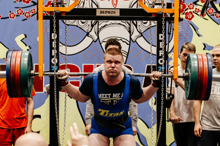 Chelyabinsk, Russia - July 16, 2017: male athlete powerlifter squat attempt during Ð¡hampionship of Asia on powerliftingのeditorial素材