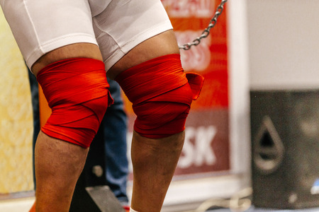 powerlifting knee wraps male athlete powerlifter to squatの写真素材
