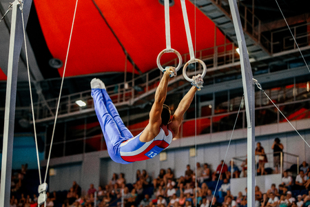 still rings exercise athlete gymnast to competition in gymnasticsの写真素材