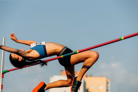 high jump female athlete jumper successful attemptの写真素材