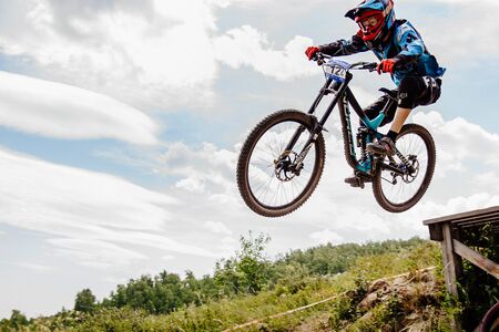 Magnitogorsk, Russia - June 23, 2019: men rider downhill mountain biking during National...
