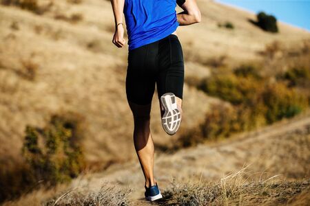 back man runner run downhill mountain autumn trail