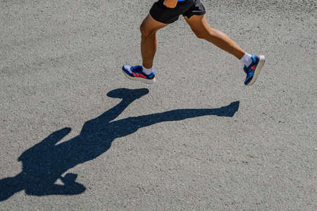 Kazan, Russia - May 17, 2022: llegs male runner run race during Kazan Marathonのeditorial素材
