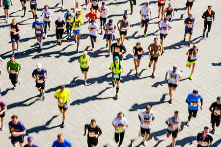 blurry motion group runners running marathonの写真素材