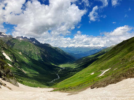 view of mountain valley in summer