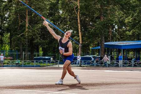 javelin throwing competition male athlete