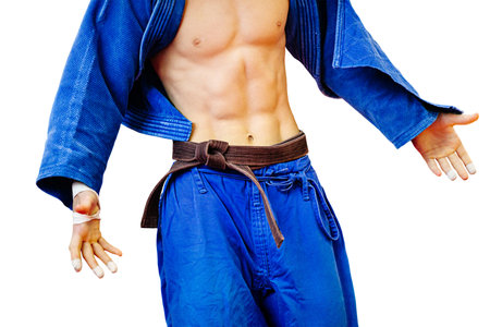 male judoka athlete in blue kimono on white backgroundの写真素材