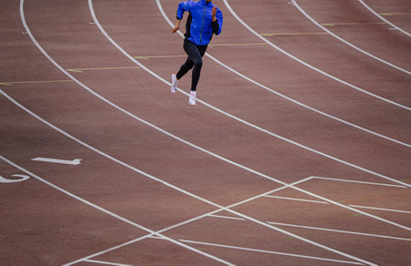 Chelyabinsk, Russia - June 4, 2022: male athlete running training in UFD Athletics Championshipのeditorial素材