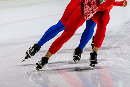legs male skaters run warm-up speed skating competition, winter sports gamesの写真素材