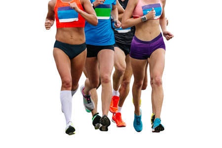 front view group female runners athletes running marathon isolated on white backgroundの写真素材