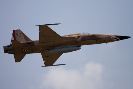 June 26, 2011. St. Thomas Ontario Canada. A United States Navy F-5 fighter flies by at the Great...