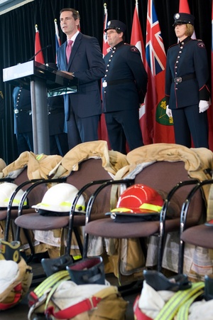 London, Canada - September 11, 2011: On the 10th anniversary of the attacks on the United States, the London Ontario Fire Department unveiled a monument honouring the 21 London Firefighters who lost their lives while on the job. Ontario Premier Dalton McGのeditorial素材