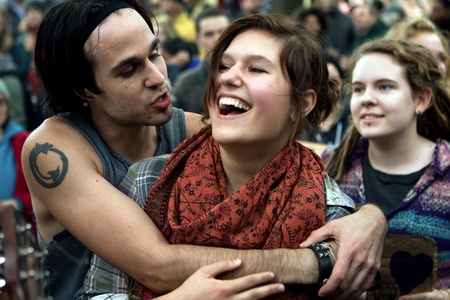 Toronto Ontario, Canada - October 15, 2011. The Occupy Wall Street movement emerged in a number of Canadian cities on Saturday. In Toronto a crowd that grew to 3000 gathered at King and Bay then marched and occupied St. James Park. The mood in the park thのeditorial素材