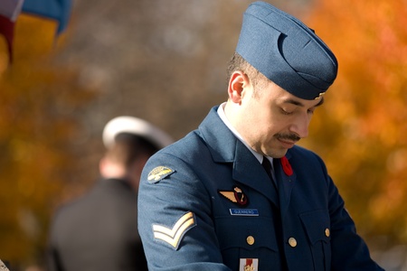 London Ontario, Canada - November 11, 2011. A Canadian airman and sailor stand posts during Remembrance Day ceremonies at the Cenotaph in Victoria Park in London Ontario Canada. のeditorial素材